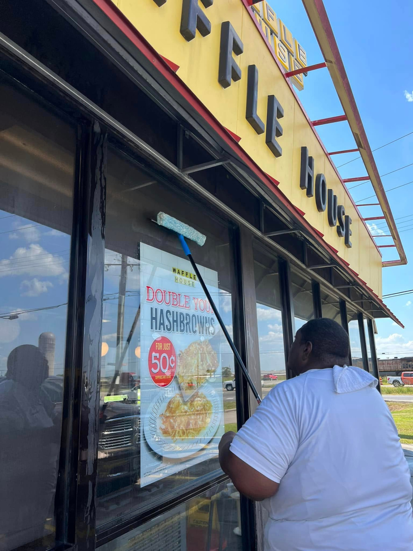 Professional window cleaning on a commercial building in Baton Rouge